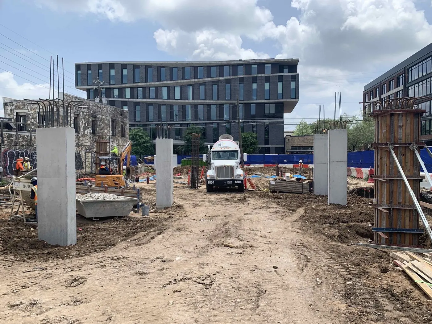New concrete columns and site work at the 6th and Chicon hotel site, downtown Austin